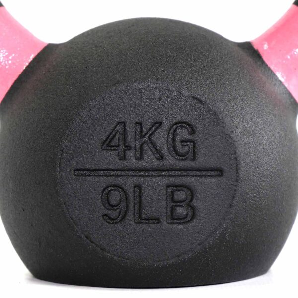 A black 4kg kettlebell with pink handles and 4KG and 9LB engraved on its surface.