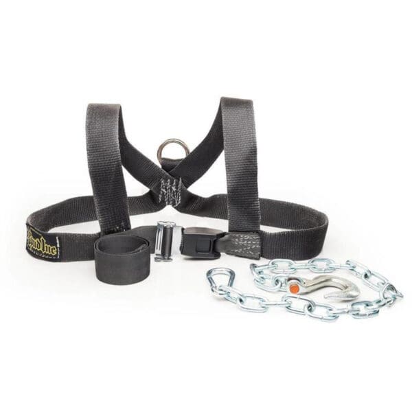 The Spud Inc. Front Squat Harness, in black, is showcased with a short chain, carabiner, and strap. It features reinforced straps, a buckle for fastening, and a D-ring for leash attachment.