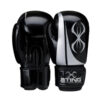 Black and white Sting Armalite Boxing Gloves feature a stylish abstract design and the Sting logo on the wrist strap.