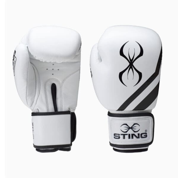 The Sting Orion Training Gloves 16oz are white boxing gloves with black tribal designs and an overlapping line logo. The right glove shows the back design, while the left displays the palm side, both labeled STING.
