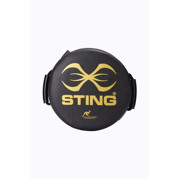 The Sting Round HD Strike Shield is a circular black pad with a gold infinity logo and STING below, featuring handles on both sides.