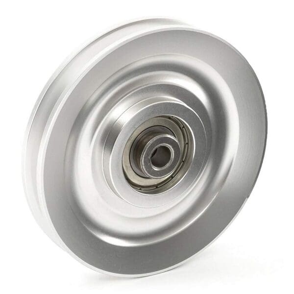 The Aluminium Pulley Wheel 115mm features a circular and ridged design, showcasing a smooth, shiny surface with a central bearing.