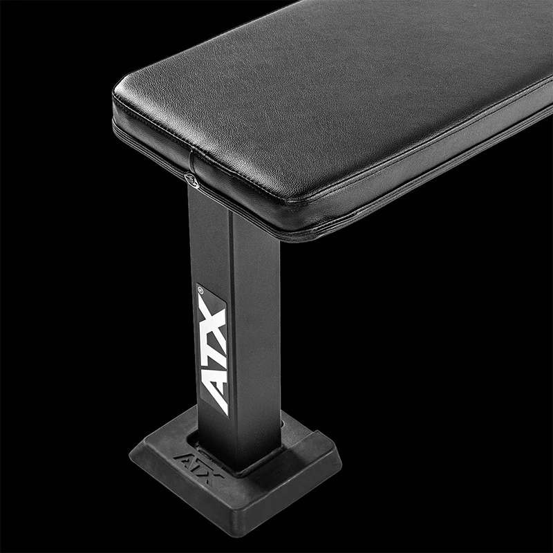 ATX® Flat Bench PRO featuring a flat workout surface with a black padded top and a square steel support base.