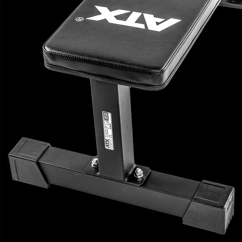 Close-up of a black ATX® Flat Bench PRO featuring a padded seat and a sturdy metal frame base.