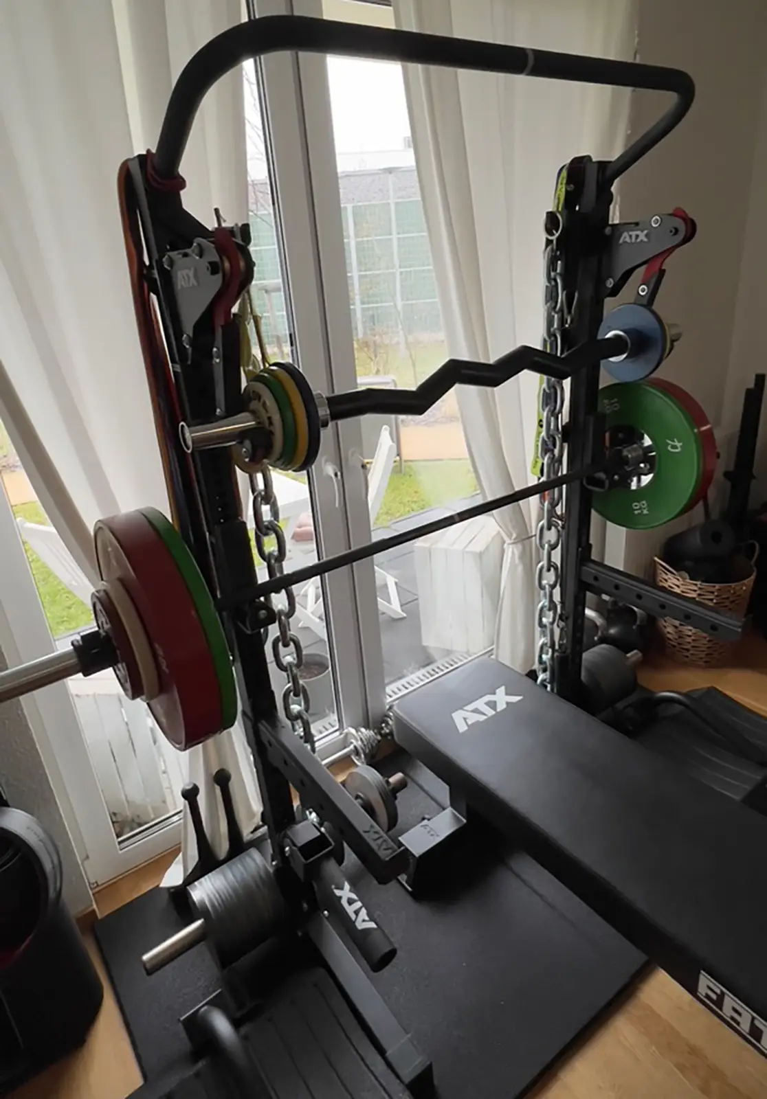 ATX 650 SD squat stands set up as a home gym with optional accessories