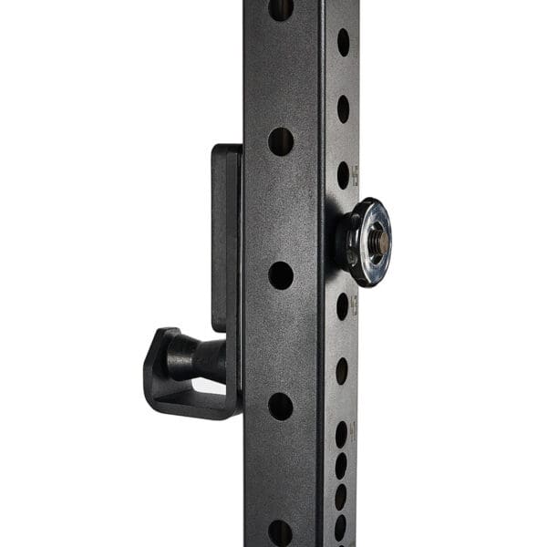 Close-up of the ATX® Roller J-Hooks Universal, featuring a black metal part with holes and a silver knob. The apparatus includes a side handle, likely part of weightlifting or adjustable rack equipment.