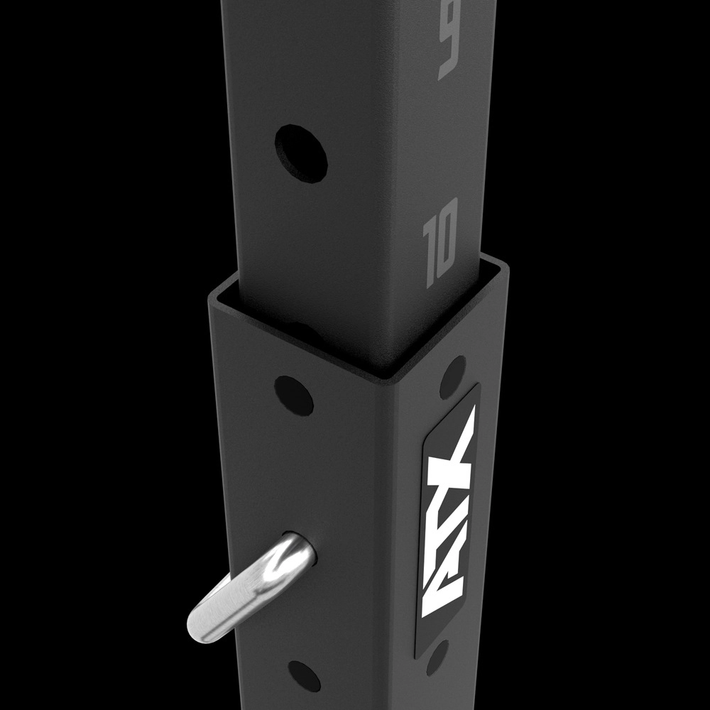 Close-up of ATX® Squat Stands 510, a black metal adjustable fitness rack with numbered holes, locking pin, and ATX logo—perfect for home gym setups.