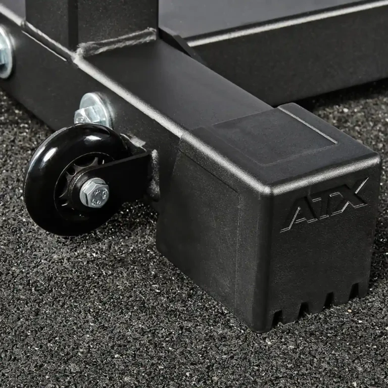 Close-up of a black ATX gym equipment base with a small wheel attached, ideal for enhancing your workout on a glute and ham raise machine.