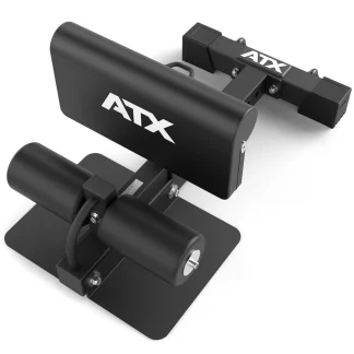 The ATX® Sissy Squat Machine features a cushioned calf support, a footplate, and two foam rollers for securing the feet.