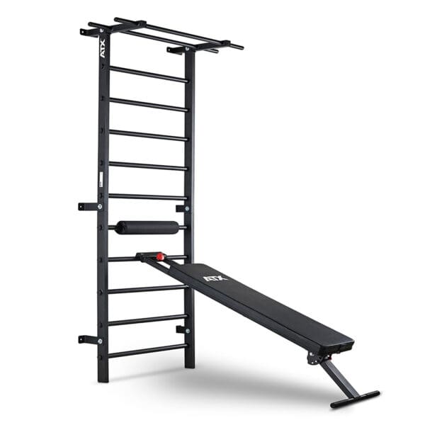 The ATX® Wall Bar Gym is a black wall-mounted setup combining Swedish bars and an angled incline bench with padded support, perfect for strength training exercises.