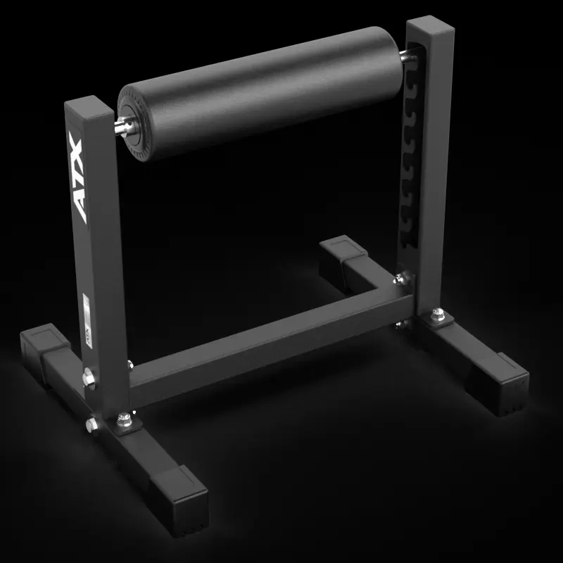 The ATX® Split Squat Stand is a black squat stand with a padded horizontal roller on a sturdy rectangular frame, designed for gym or strength training, shown against a dark background.