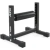 The image showcases the ATX® Split Squat Stand in black, featuring a sturdy frame with a cylindrical padded roller at the center. Its perfect for leg or back exercises and has a robust rectangular base to ensure maximum stability during workouts.