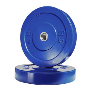Two black Olympic bumper weight plates are pictured, one standing upright against another lying flat. Both bear the 20 kg engraving and have a central metallic hole for mounting on a barbell.