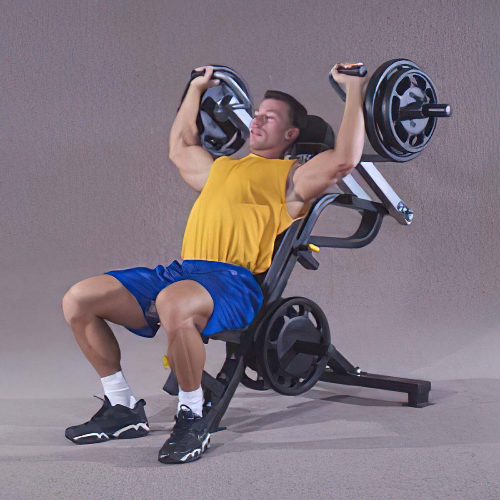 L-SP Powertec Leverage Shoulder Press with a man performing the exercise