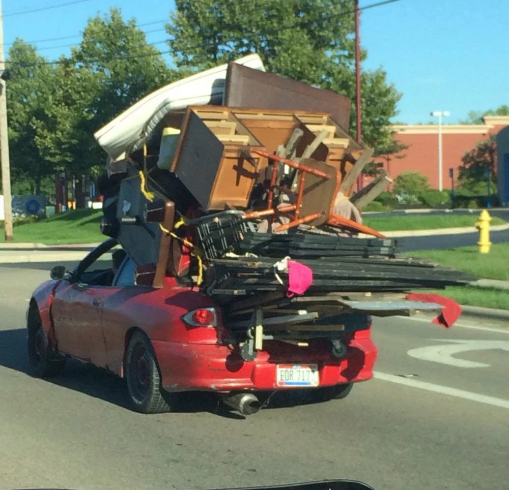 car overloaded with furniture