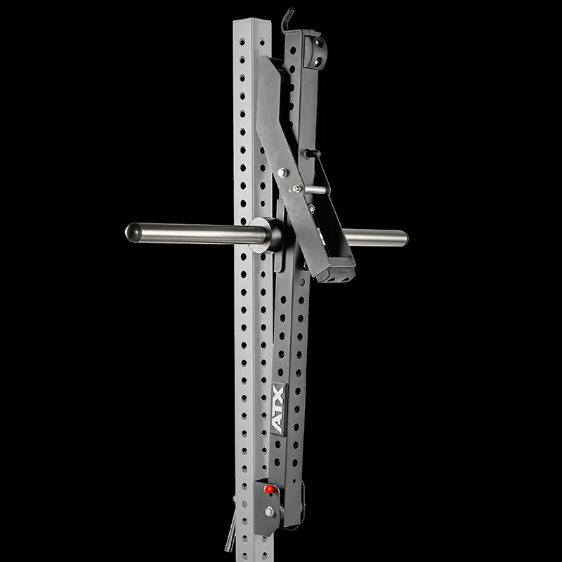 A close-up of the ATX® Belt Squat Option gym rack attachment features multiple adjustment holes and a horizontal handlebar, set against a black background.