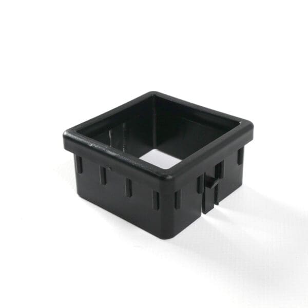 The Upright Sleeve Insert 75x75 is a black, rectangular plastic casing with open sides and a notched design, shown against a white background.