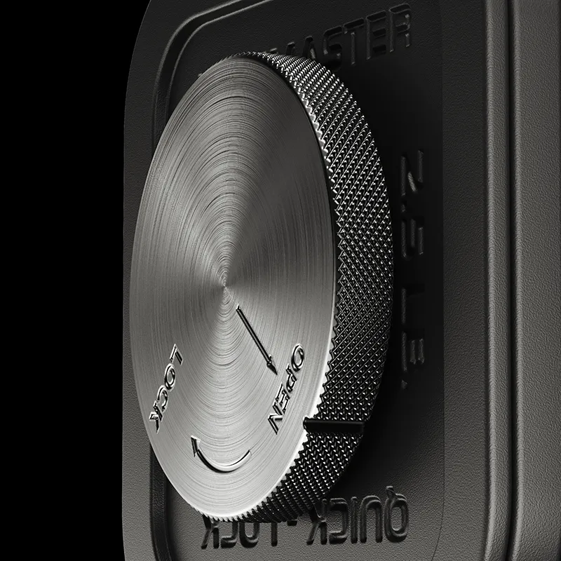 Close-up of the Ironmaster 75 LB Quick-Lock Adjustable Dumbbell Set dial, highlighting engraved instructions for adjusting weights. The metallic texture and details of the dumbbell stand out against a dark background.