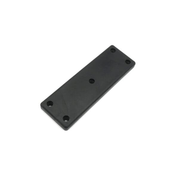 The ATX Squat Leverage Arm Rubber is a rectangular black plastic plate with five evenly spaced holes along its edges and center. Its surface is smooth with a matte finish, likely serving as a mounting bracket or cover.
