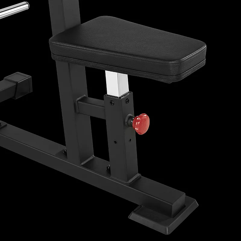A close-up of the ATX® Pec Fly/Rear Delt Machine shows its adjustable black padded seat on a metal frame with a red adjustment knob, set against a black background.