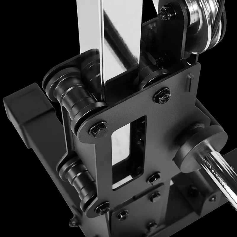 Close-up of the ATX® Pec Fly/Rear Delt Machine’s rollers, shafts, and metal parts against a black background.