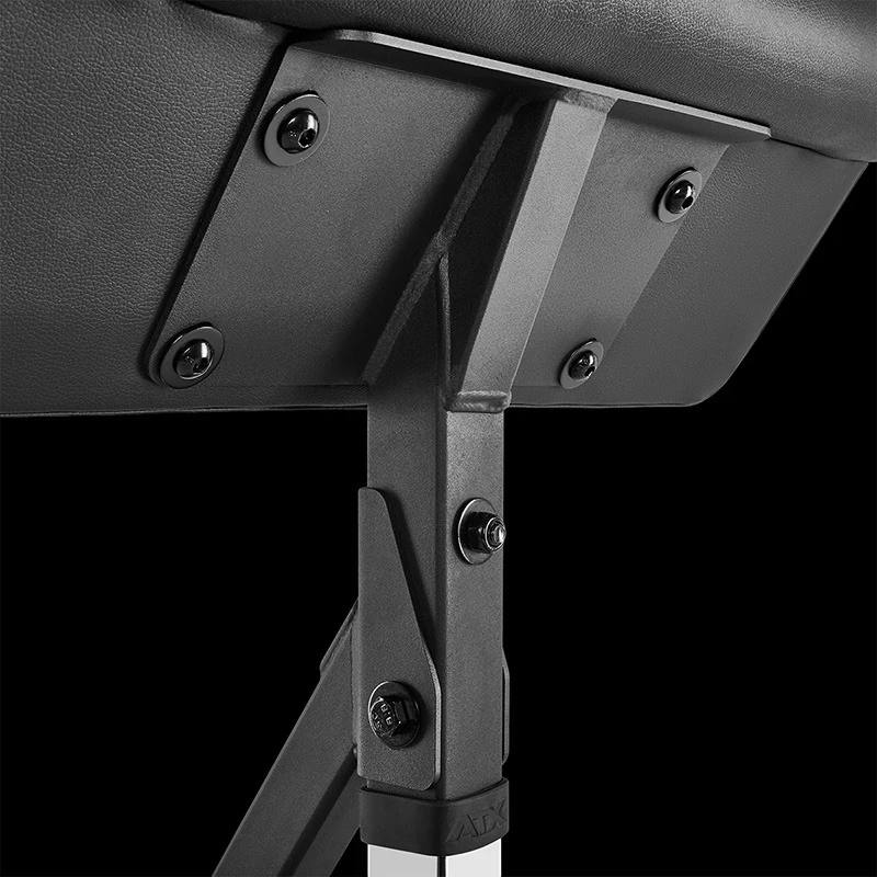 Close-up of the underside of an ATX Bicep Curl Pad, showing the metal mounting bracket and height-adjustable column of the bench attachment.