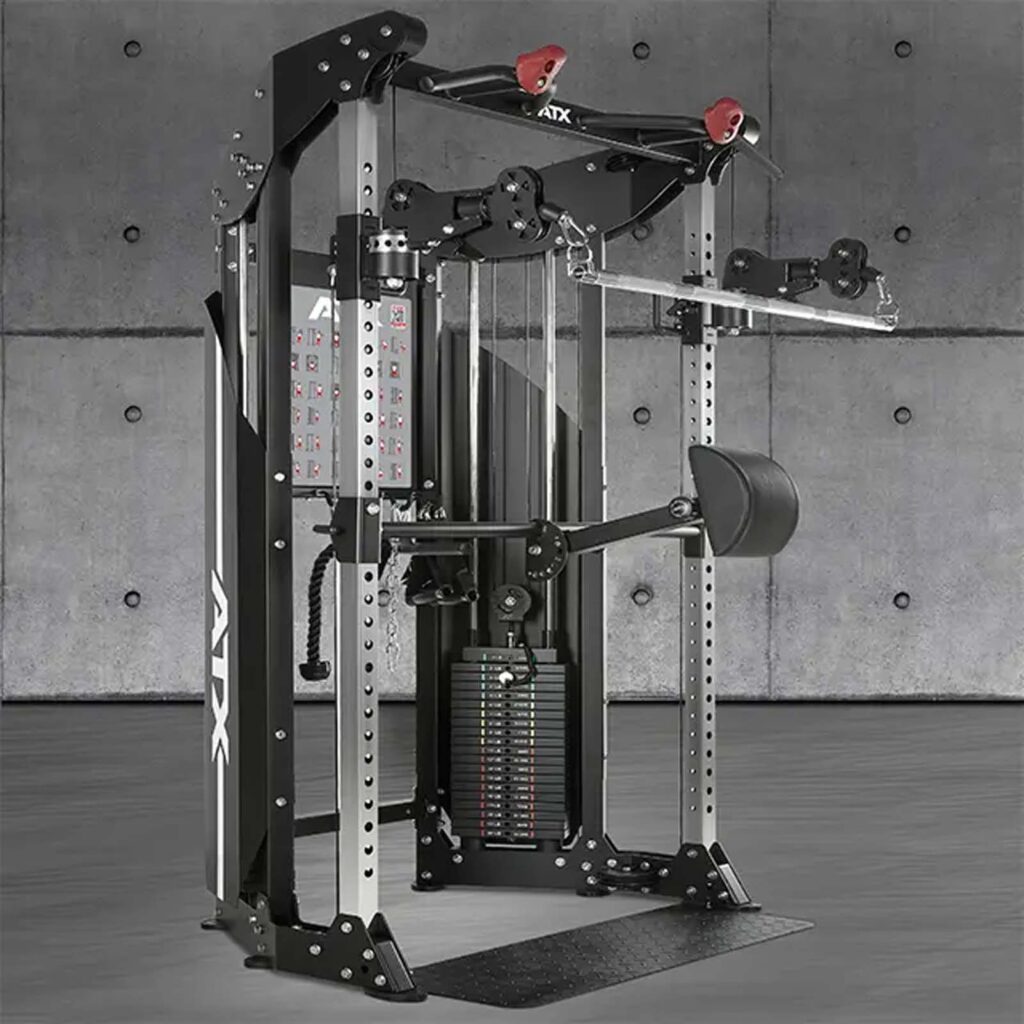 A professional cable crossover machine with pulleys, weights, and adjustable attachments stands in a modern gym setting with a gray concrete wall in the background.