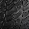 Close-up of the rugged ATX® Slam Ball, featuring a black textured surface with deep grooves and angular raised patterns designed for optimal grip.