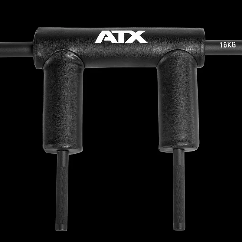 Close-up of a black ATX® Safety Squat Bar - 50mm, featuring two vertical handles and two horizontal rods, labeled 16KG on the right side, set against a black background.