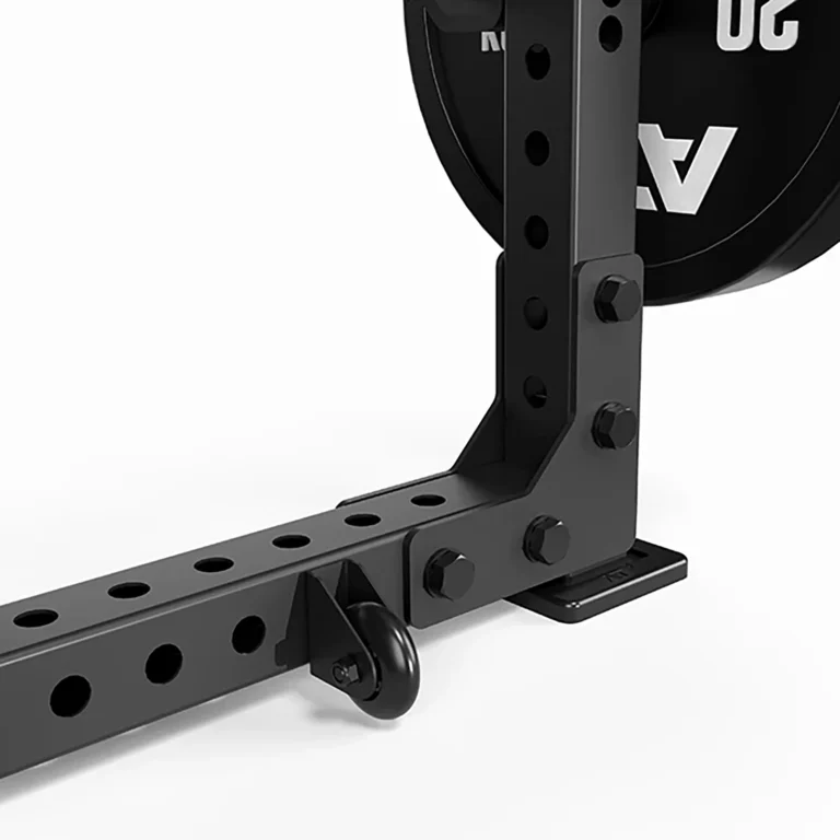 A close-up of a black ATX® Seal Row Bench with customizable adjustments and multiple drilled holes. A weight plate marked 50 is partially visible on the right side.