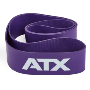 A coiled purple ATX® Latex Free Resistance Band, featuring white letters on its surface, forming an S-shape.