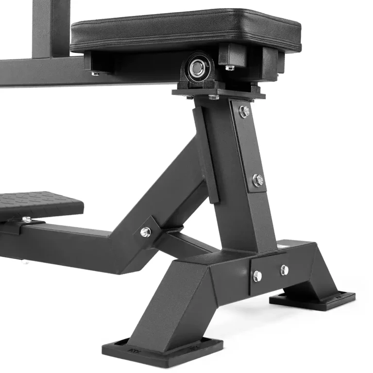 Close-up of a sturdy, black metal adjustable weight bench, reminiscent of an ATX Seated Calf Raise Machine, focusing on the seat and support base. The bench features thick padding, robust metal bolts, and a durable design suitable for heavy lifting in gym settings.