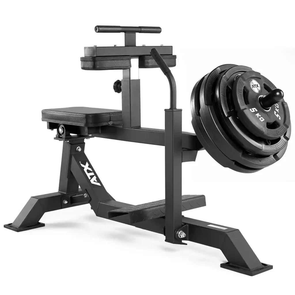 A sturdy black metal frame supports the ATX seated calf raise machine. It features a padded seat and adjustable support, with several weight plates neatly stacked on one side. The brand ATX is prominently displayed on the frame.