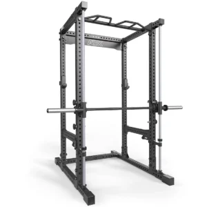 The ATX® PRX-780, a gray power rack with barbell, offers adjustable height via multiple holes, includes a pull-up bar and Smith Machine bar attachment for weightlifting and strength training exercises.