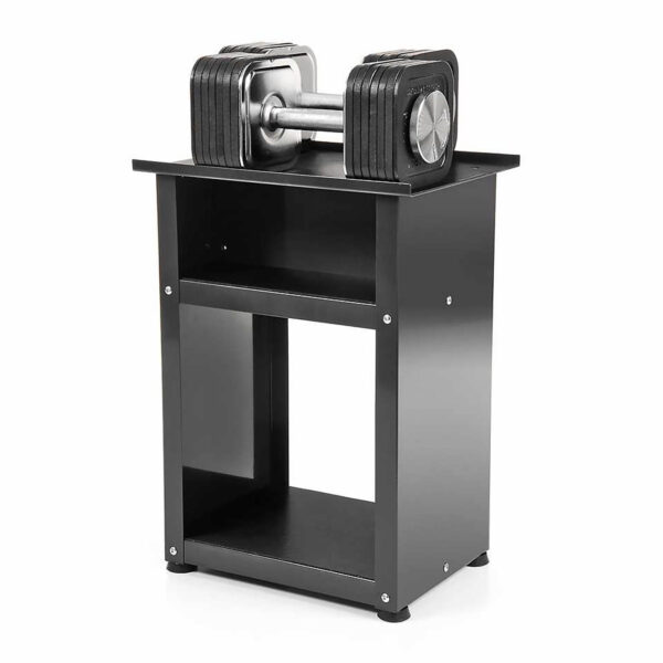 A pair of Ironmaster Quick-Lock Adjustable Dumbbells rests on a sleek black open-shelf stand. With visible weight markings and a modern design, they combine style and functionality. The minimalistic, sturdy rectangular stand is ideal for efficient home gym storage.