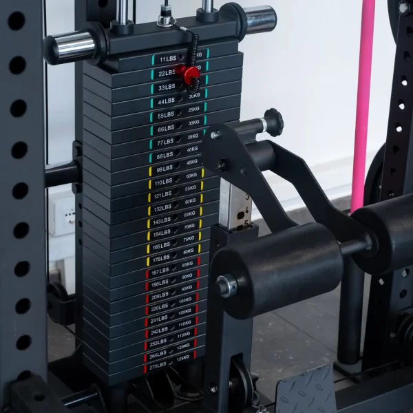 The ATX® Power Cage with Cables has a weight stack featuring plates labeled in pounds and kilograms, ranging from 11 lbs (5 kg) to 170 lbs (77 kg). The pin is currently set at the 27 lbs (12 kg) plate.