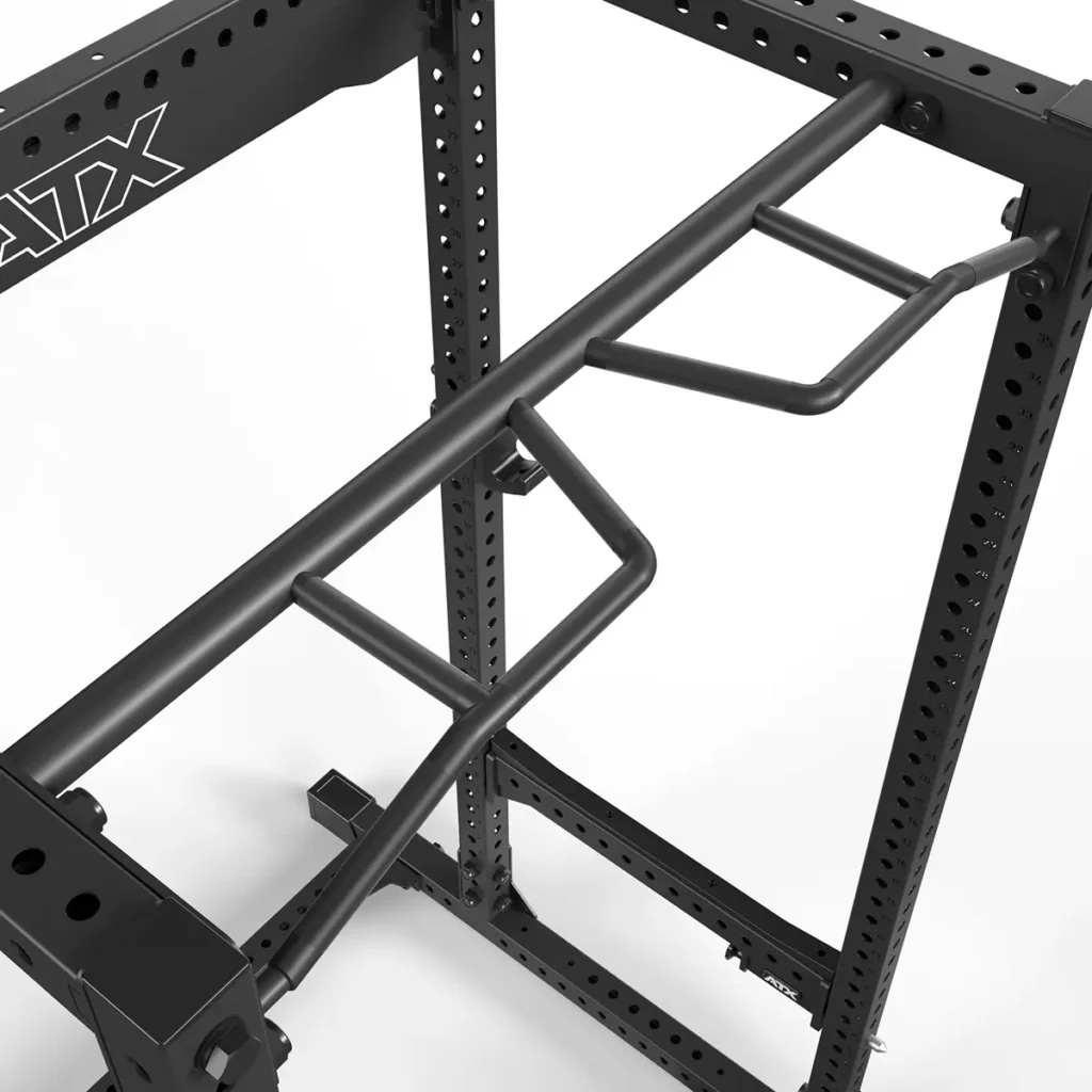 A close-up view of the ATX® Power Rack 780 with a black multi-grip pull-up bar attached, offering various angled grips for diverse pull-up variations. The sturdy frame features evenly spaced holes for easy adjustments.