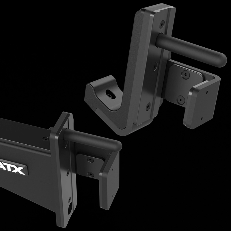 Close-up of two black metal J-cup barbell holders with protective padding, designed for the ATX® Monster 2.0 All In One Trainer or power rack. The black background accentuates the equipment’s details.