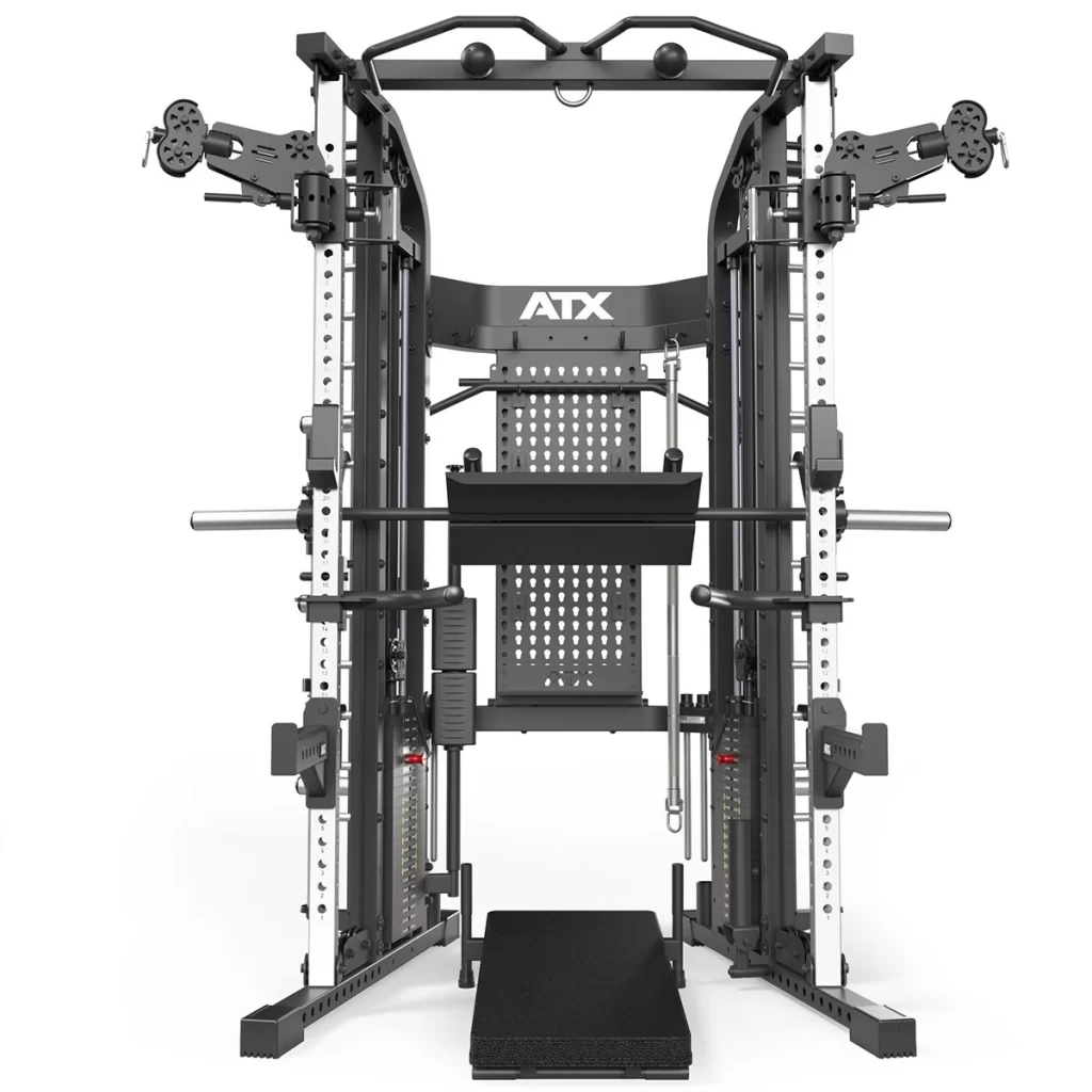 The ATX® Monster 2.0 All In One Trainer features attachments like pulleys, bars, and weights for complete strength training. ATX is displayed on top, making it versatile for any workout regimen.