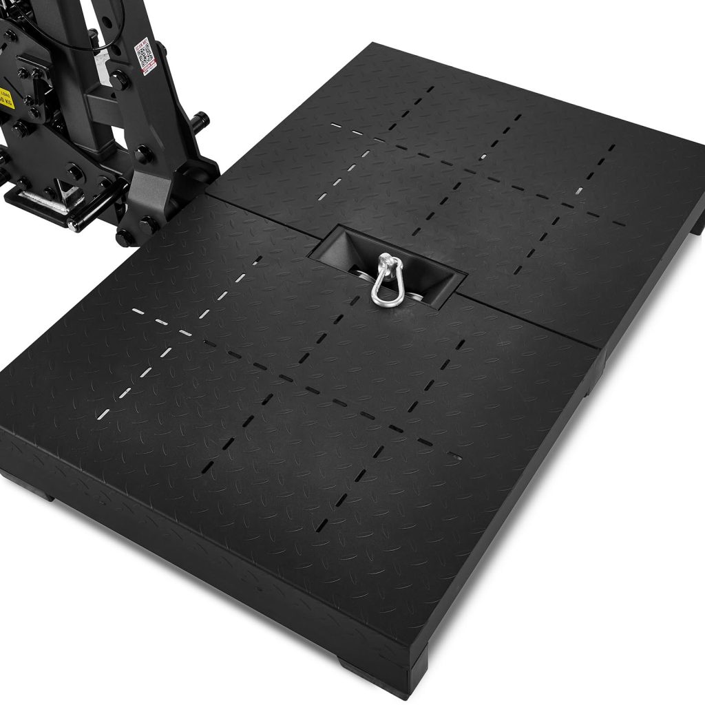 Close-up of a black diamond plate platform with a central mounting hook from the ATX-BSM-760 Belt Squat Machine. Positioned on the floor, it shows part of a lever-like mechanism on the left.