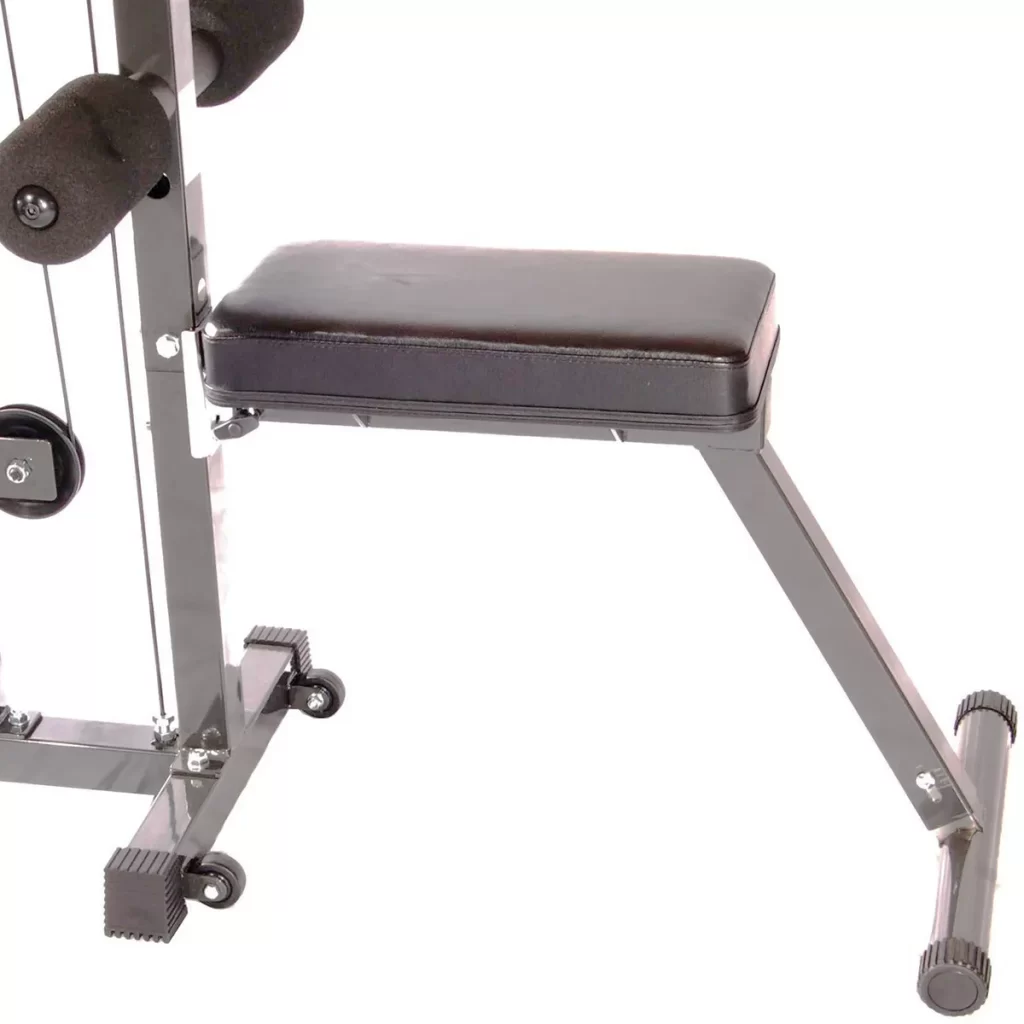 A close-up of a weight machine featuring a padded seat and backrest. The machine includes support bars with handles and weights on pulleys. It is set on wheels for mobility. The frame is metallic with black padding.