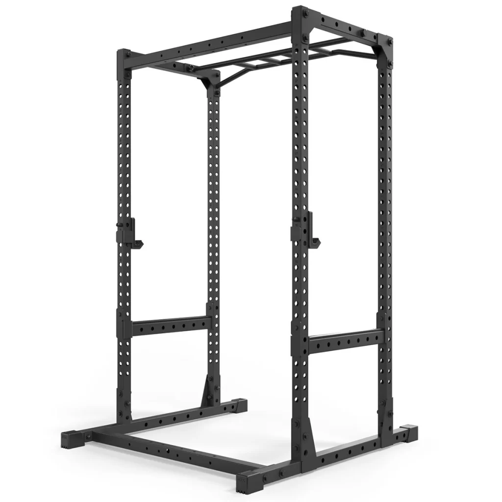 A black metal power rack with adjustable safety bars and multiple holes for attachments. It has a pull-up bar at the top and sturdy, rectangular base for stability. The design is simple and functional for strength training exercises.