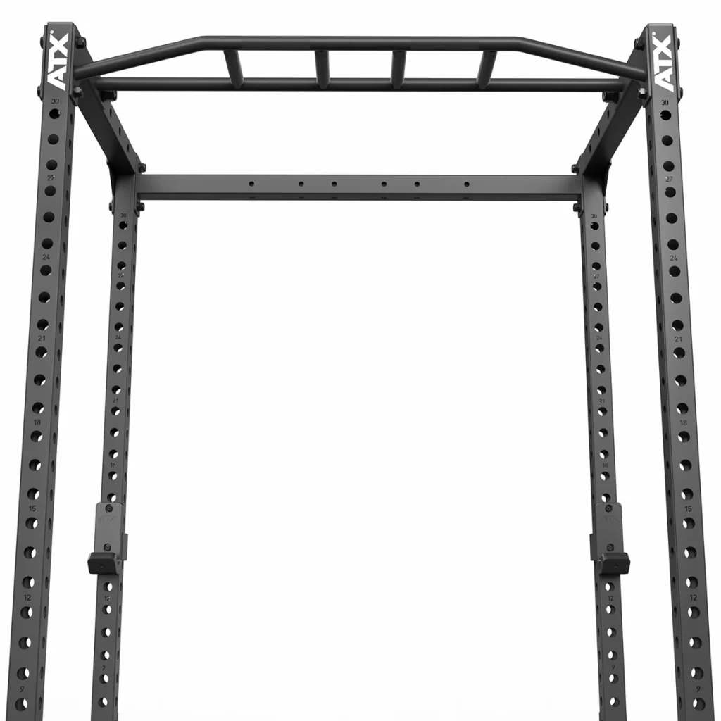 A black power rack with multiple holes for adjustable settings and an upper pull-up bar attachment against a white background.