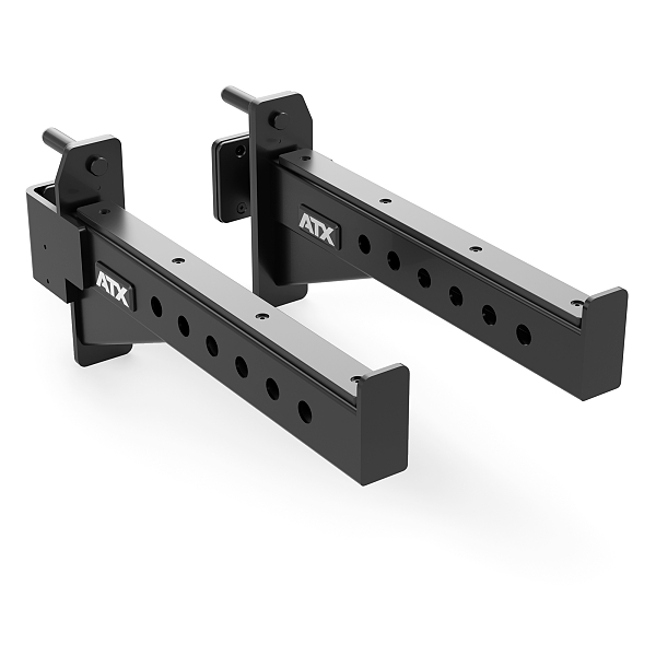 The ATX Safety Spotter Arms 600 are black metal safety arms with multiple adjustment holes, handles, and ATX logos. Theyre designed for use with a power cage or squat rack to ensure weightlifting safety.