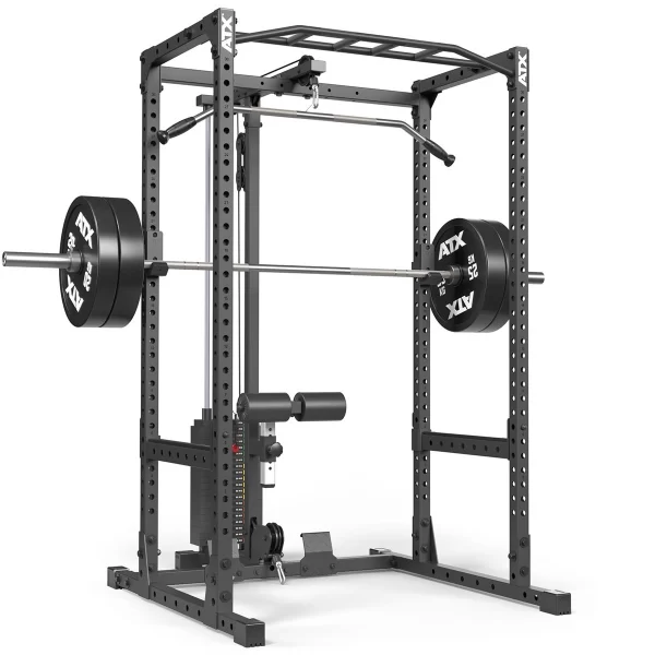 Home gym equipment featuring a power rack with a loaded barbell on safety racks. It includes a pull-up bar, cable machine, and leg extension attachments. The frame is black with visible weight plates on the barbell.