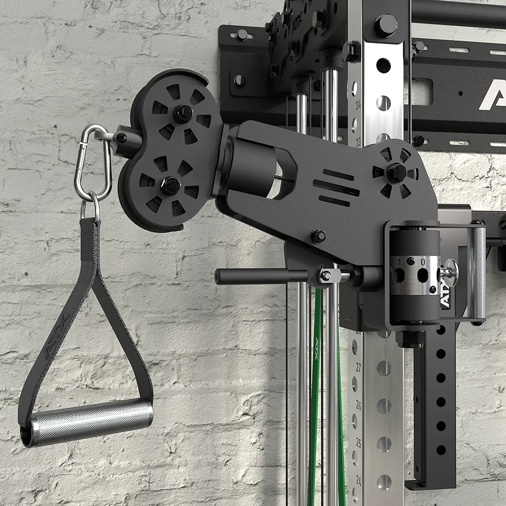 Close-up of the ATX Half Rack with Cable Crossover, featuring a black pulley system and metal handle attachment, mounted against a light-colored brick wall—ideal for strength training and cable exercises.