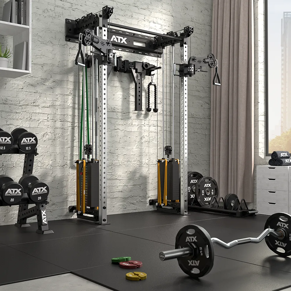 A modern home gym with the ATX Half Rack with Cable Crossover, weights, barbells, resistance bands, and exercise mats on a black floor. Natural light from a large window brightens white walls and sleek shelves.