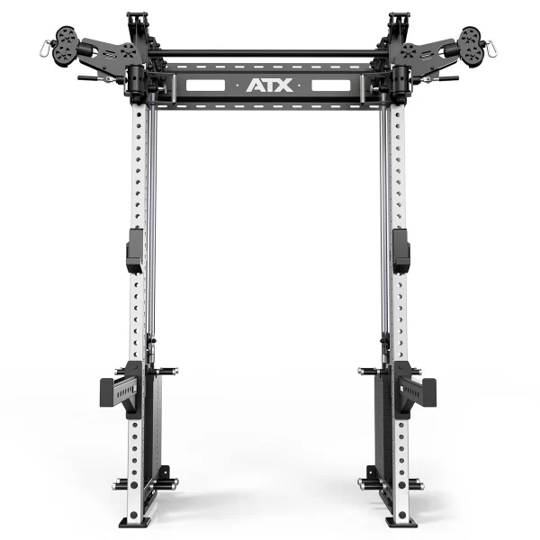 A black and silver power rack with adjustable safety bars and various attachment points, labeled ATX at the top. It’s designed for weightlifting and strength training exercises.