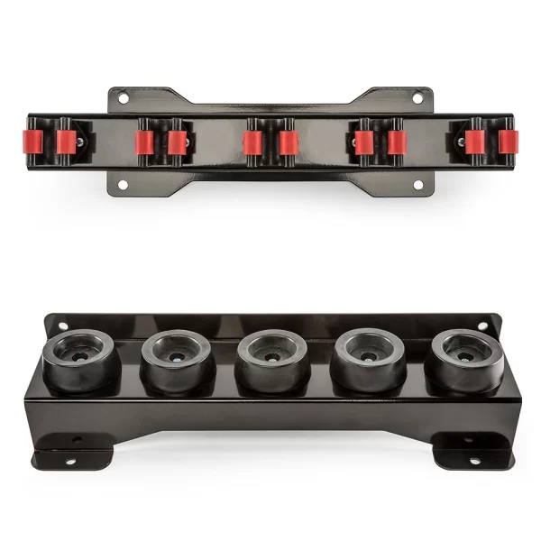 Two black wall-mounted skateboard storage racks are shown. The top rack uses red slots to hold the wheels, while the bottom has individual circular slots for storing each wheel separately. Both racks have metal construction.