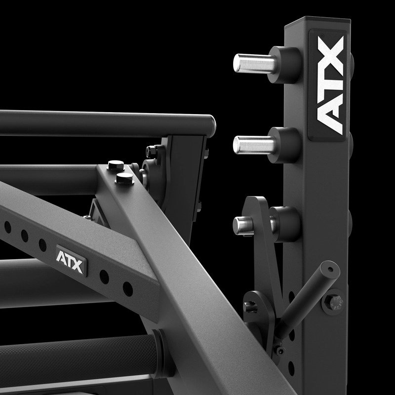 Close-up of the ATX® Pendulum Squat Machine, featuring a black finish with sturdy metal pegs and support bars for weightlifting; showcased against a plain black background.